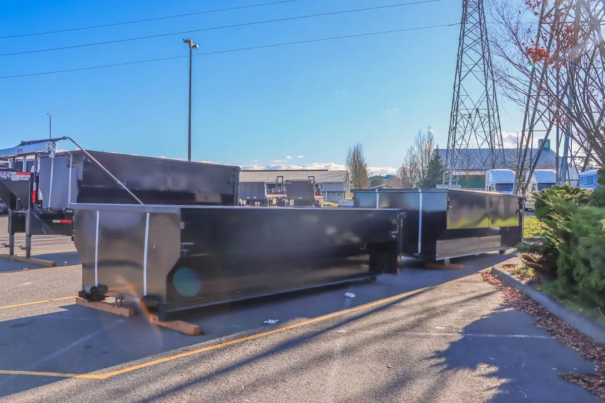 Roll-off dumpster ready for waste disposal at job site for 12 Yard Dumpster Rental in Stallings